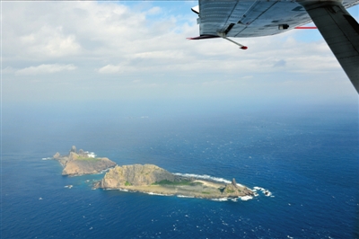 昨天从海监飞机上拍摄的钓鱼岛及其附属岛屿画面。新华社发